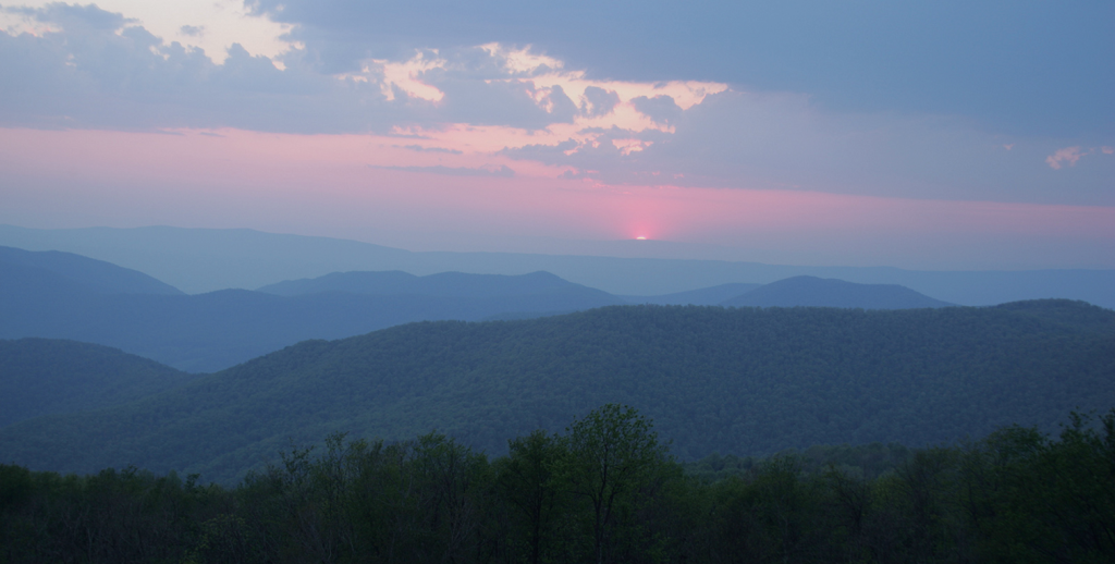 mountains with a colorful red sunset